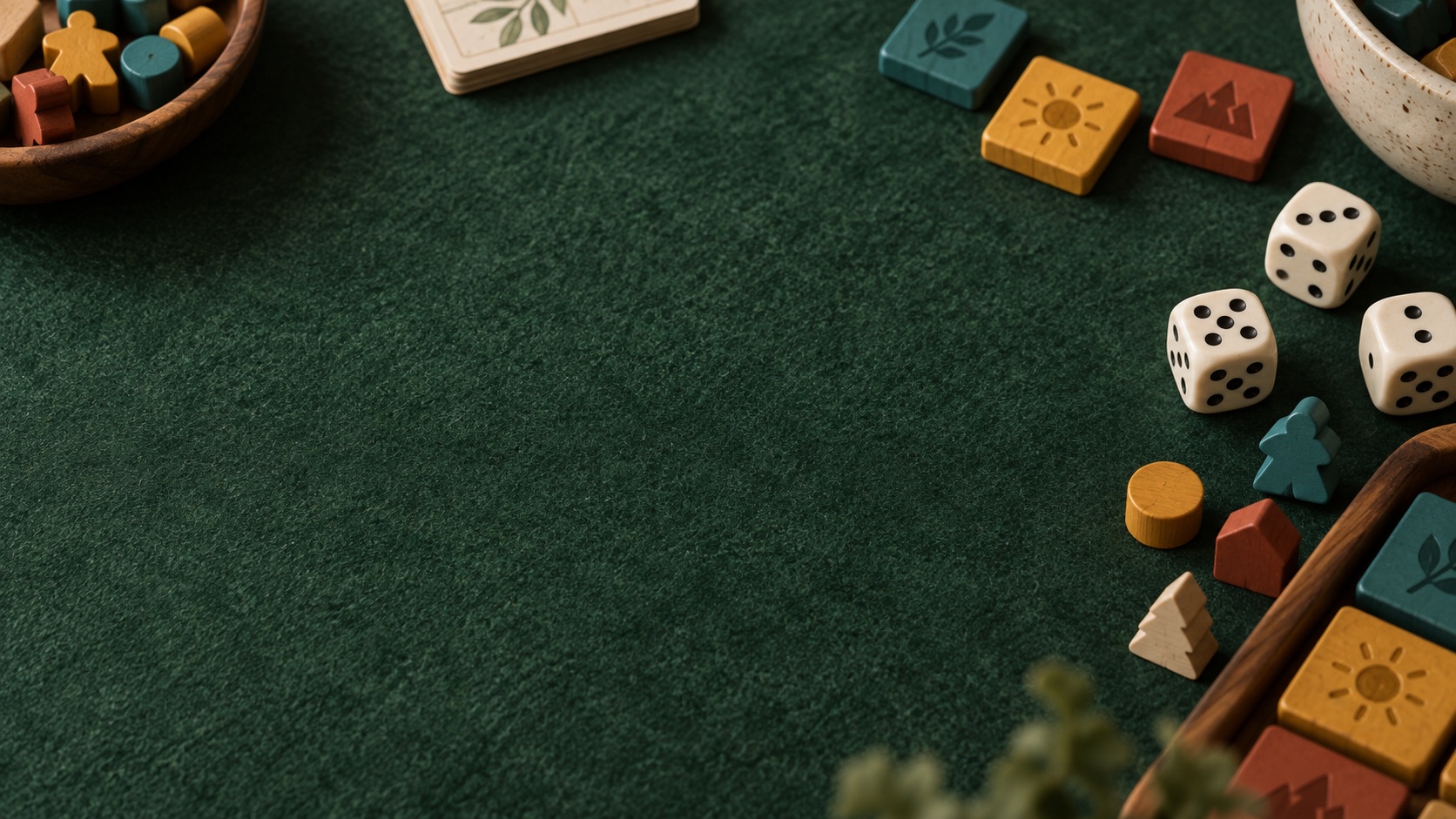 Colorful game tiles, wooden pieces, and ivory dice on a deep green tabletop